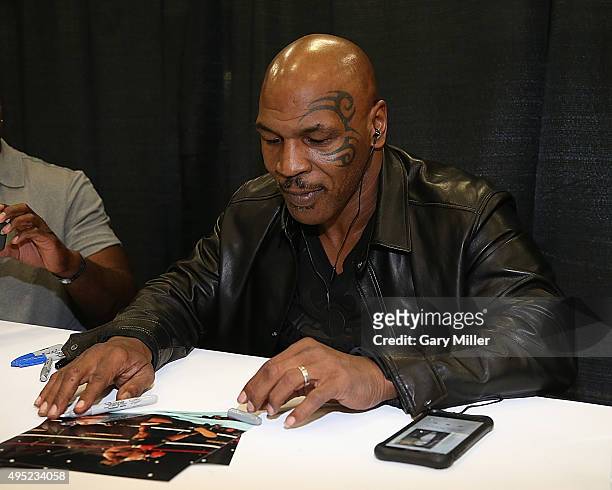 Mike Tyson meets with fans during the Wizard World Comic Con Austin at the Austin Convention Center on October 31, 2015 in Austin, Texas.