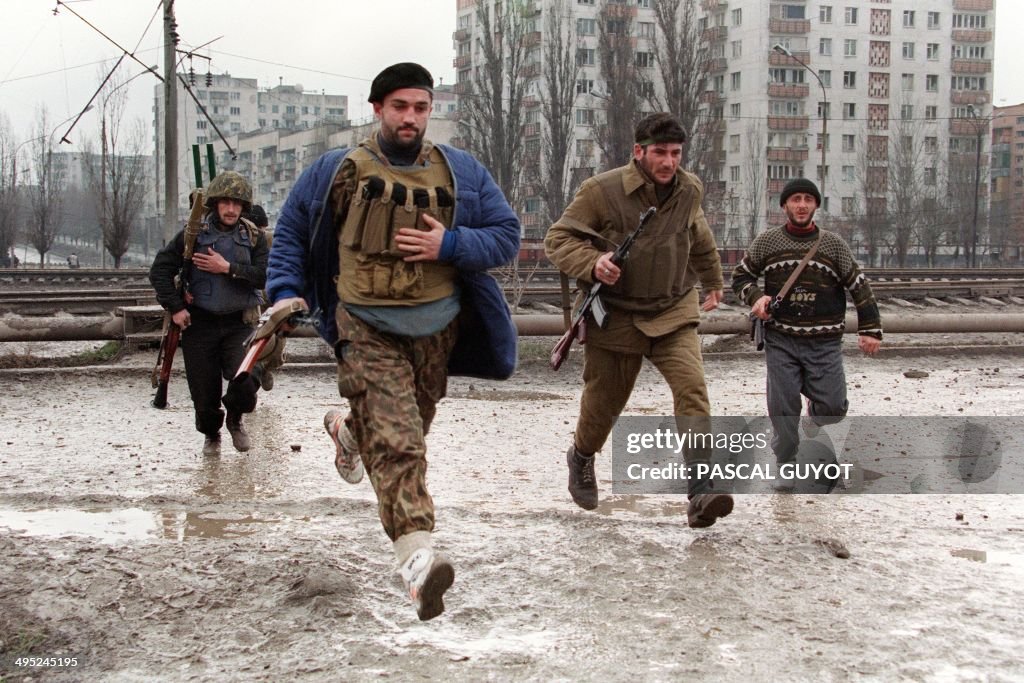 CHECHNYA-FIGHTERS-SNIPER FIRE
