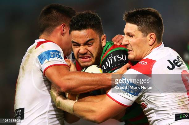 Dylan Walker of the Rabbitohs is tackled during the round 12 NRL match between the South Sydney Rabbitohs and the St George Illawarra Dragons at ANZ...