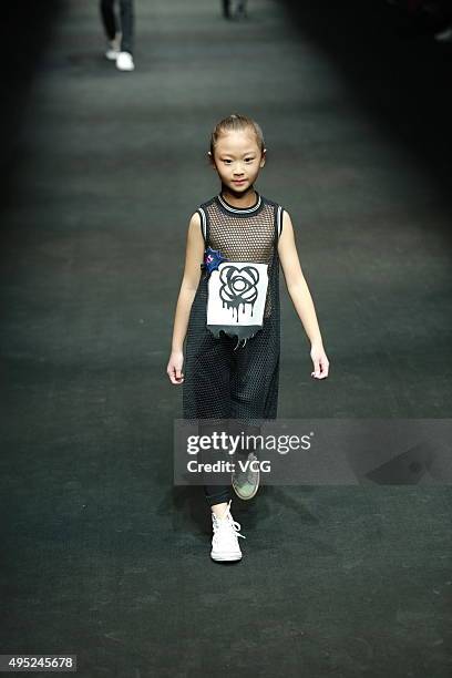 Model showcases designs on the runway at Hello Kitty & My Melody-Comme Tu Es Collection during the Mercedes-Benz China Fashion Week S/S 2016...