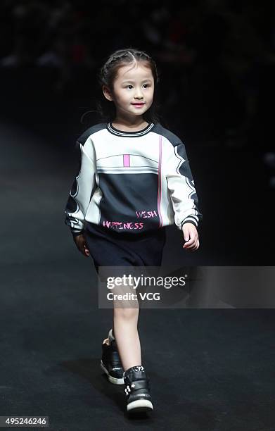 Model showcases designs on the runway at Hello Kitty & My Melody-Comme Tu Es Collection during the Mercedes-Benz China Fashion Week S/S 2016...