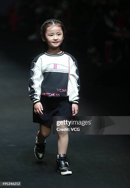 Model showcases designs on the runway at Hello Kitty & My Melody-Comme Tu Es Collection during the Mercedes-Benz China Fashion Week S/S 2016...