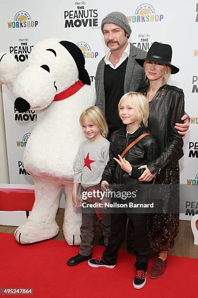 Snoopy, Liev Schreiber, Naomi Watts, Samuel Kai Schreiber and Alexander Pete Schreiber attend the Peanuts movie and Build-A-Bear Workshop special...