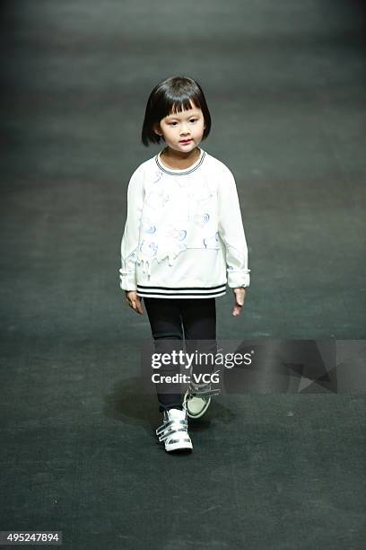 Model showcases designs on the runway at Hello Kitty & My Melody-Comme Tu Es Collection during the Mercedes-Benz China Fashion Week S/S 2016...