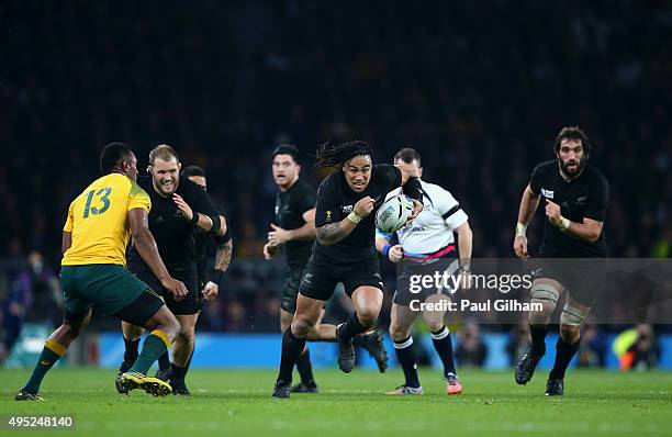 Ma'a Nonu of New Zealand breaks through to score his team's second try during the 2015 Rugby World Cup Final match between New Zealand and Australia...