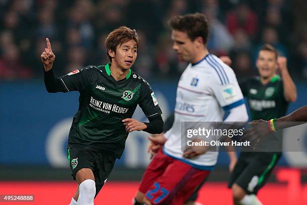 Hiroshi Kiyotake of Hannover celebrates after scoring their first goal during the First Bundesliga match between Hamburger SV and Hannover 96 at...