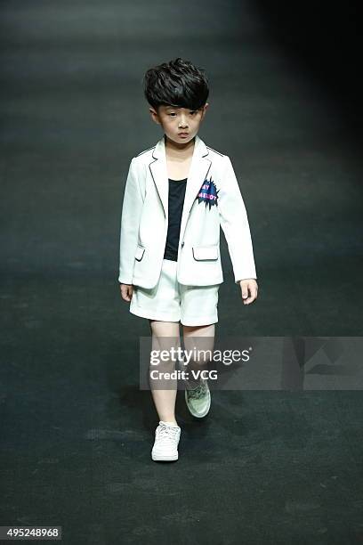 Model showcases designs on the runway at Hello Kitty & My Melody-Comme Tu Es Collection during the Mercedes-Benz China Fashion Week S/S 2016...