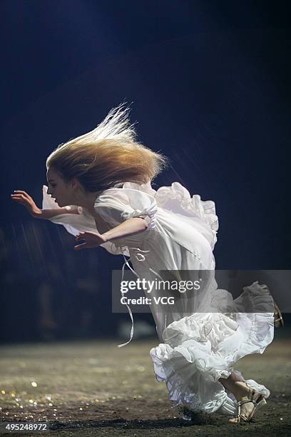 Model falls down when showcases designs at Lisa Yu.Lisa Collection during the Mercedes-Benz China Fashion Week S/S 2016 Collection at 751D.PARK on...