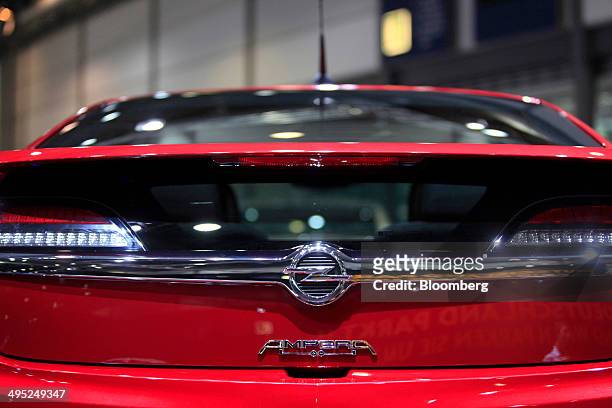 An Opel Ampera hybrid automobile, produced by General Motor Co., sits on display at the Auto Mobil International automotive trade fair, at Leipziger...