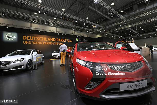 Opel Ampera hybrid automobiles, produced by General Motor Co., sit on display at the Auto Mobil International automotive trade fair, at Leipziger...