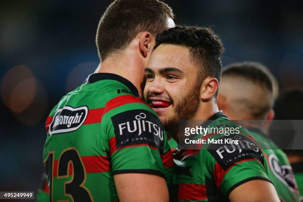 Dylan Walker of the Rabbitohs celebrates with Sam Burgess after scoring a try during the round 12 NRL match between the South Sydney Rabbitohs and...