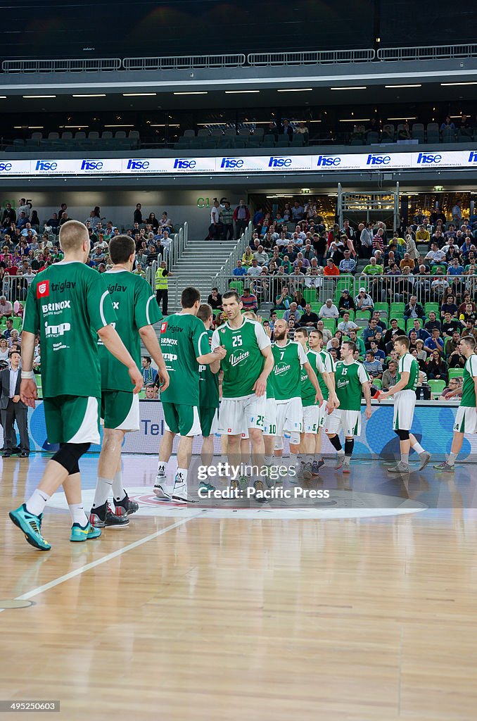 Teams greeting each other at the beginning of the game.