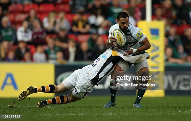 Sailosi Tagicakibau of Leicester is tackled by Elliot Daly of Wasps during the Aviva Premiership match between Leicester Tigers and Wasps at Welford...