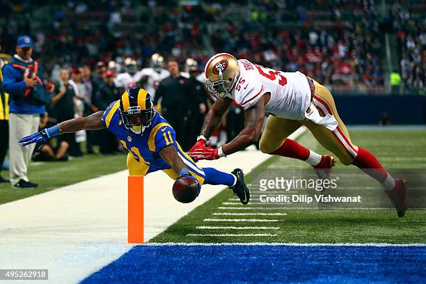 Tavon Austin of the St. Louis Rams scores a touchdown past Ahmad Brooks of the San Francisco 49ers in the second quarter at the Edward Jones Dome on...