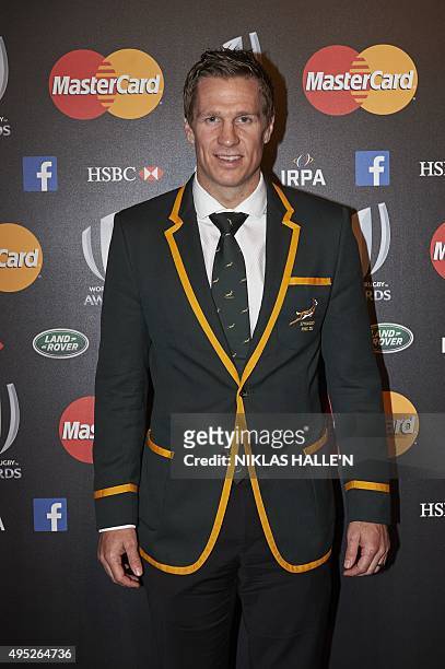 Former South Africa captain Jean de Villiers poses on arrival at the World Rugby Awards in London on November 1, 2015. AFP PHOTO / NIKLAS HALLE'N