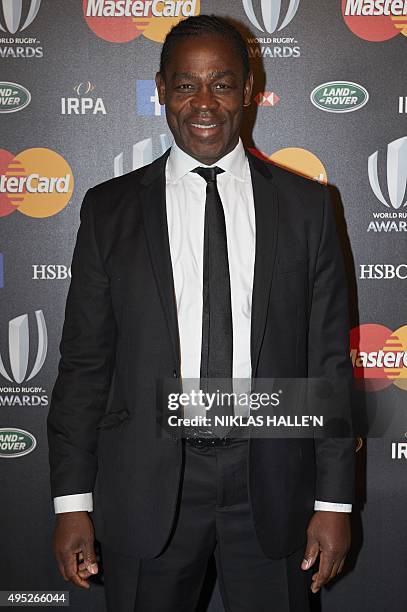 Former French rugby international Serge Betsen poses on arrival at the World Rugby Awards in London on November 1, 2015. AFP PHOTO / NIKLAS HALLE'N