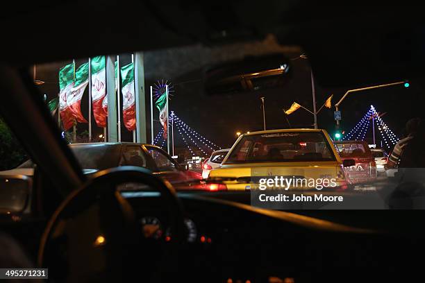 Traffic moves slowly through the streets on June 1, 2014 in Esfahan, Iran. This week Iran marks the 25th anniversary of the death of Khomeini and the...