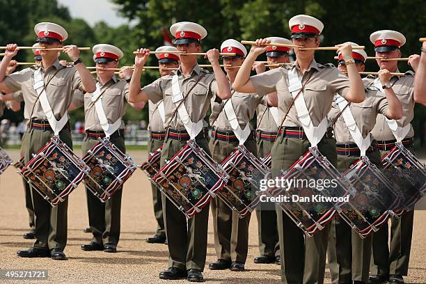 Members of the Royal Marines rehearse for the ceremonial 'Beating Retreat' event on Horse Guards Parade on June 2, 2014 in London, England. The event...