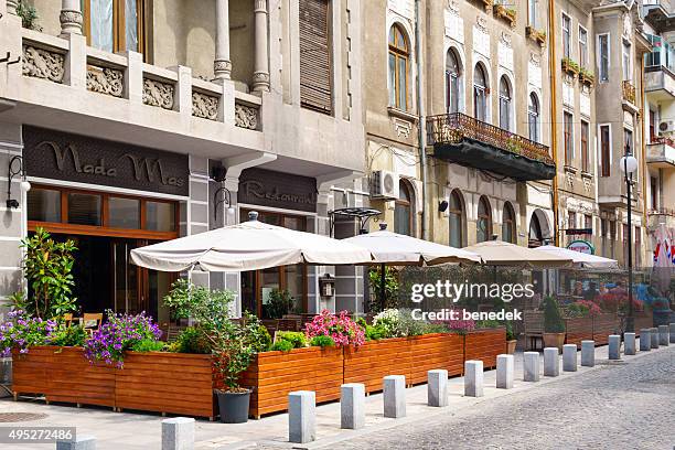 bucharest downtown restaurant patio - bucharest stock pictures, royalty-free photos & images