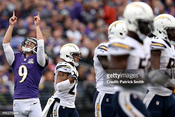 Kicker Justin Tucker of the Baltimore Ravens celebrates after kicking a third quarter field goal against the San Diego Chargers at M&T Bank Stadium...