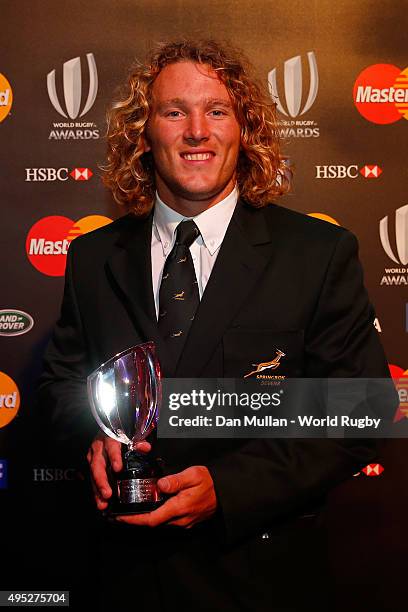 Werner Kok of South Africa poses after receiving the Men's 7's Player of the Year award during the World Rugby via Getty Images Awards 2015 at...