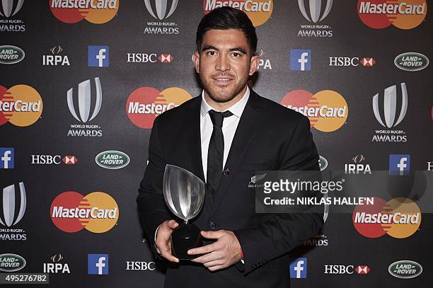 New Zealand rugby union player Nehe Milner-Skudder poses for photographers after winning the Breakthrough Player of the Year award at the World Rugby...