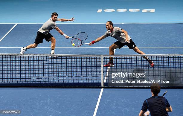 Doubles Champions Alexander Peya of Austria and Bruno Soares of Brazil in action against Jamie Murray of Scotland and John Peers of Australia at the...