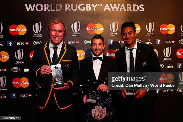 Schalk Burger of South Africa, Greig Laidlaw of Scotland and Julian Savea of New Zealand pose after receiving the Societe Generale RWC Dream Team...