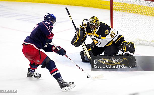 Dustin Jeffrey of the Springfield Falcons takes a shot on Malcolm Subban of the Providence Bruins during an American Hockey League game at the...