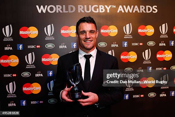 Dan Carter of New Zealand poses after receiving the World Rugby via Getty Images Player of the Year award during the World Rugby via Getty Images...