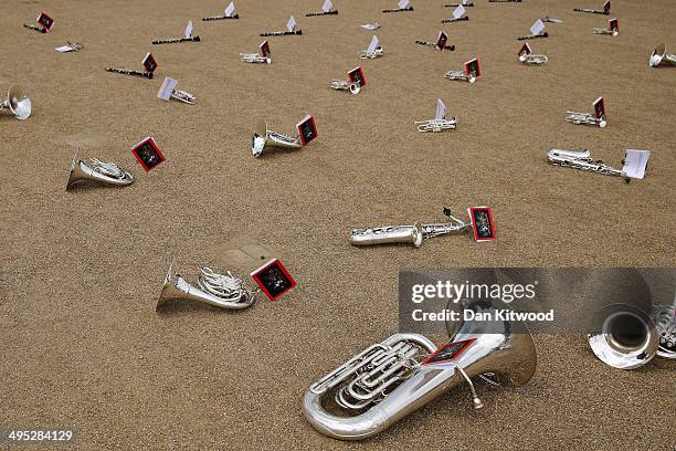 Instruments lie on the ground as members of the Royal Marines rehearse for the ceremonial 'Beating Retreat' event on Horse Guards Parade on June 2,...