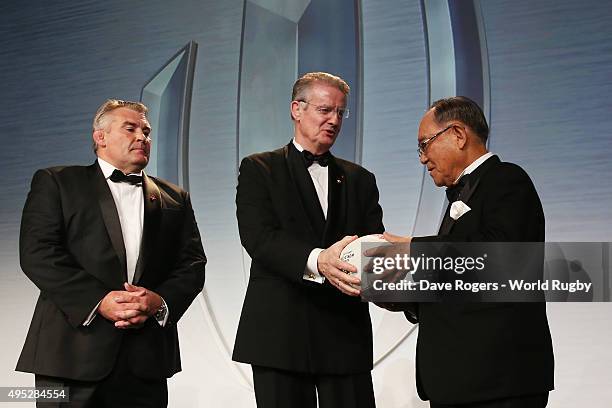 Fujio Mitarai , President of the RWC 2019 organizing committee receives the official handover from the President of the RFU during the World Rugby...