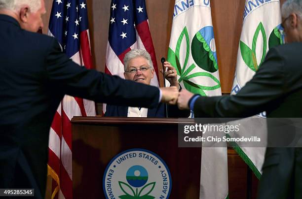 Fist-bumps were exchanged as U.S. Environmental Protection Agency Administrator Gina McCarthy arrives to announce new regulations for power plants...