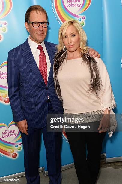 Richard Desmond and Joy Desmond attend the Health Lottery Tea Party at The Savoy on June 2, 2014 in London, England.