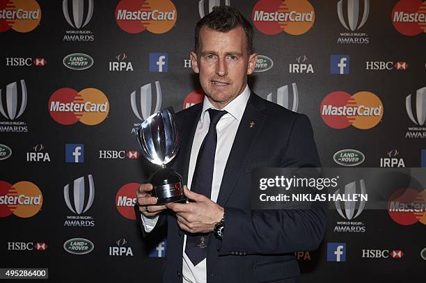 Welsh referee Nigel Owens poses for photographers after winning Referee of the Year Award at the World Rugby Awards in London on November 1, 2015....