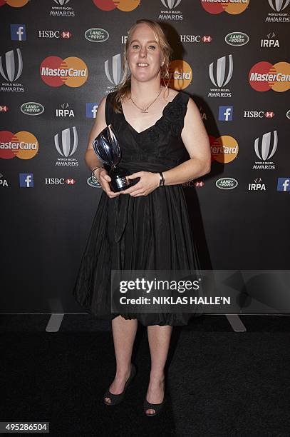 New Zealand Rugby union player Kendra Cocksedge poses for photographers after winning Women's Player of the Year Award at the World Rugby Awards in...