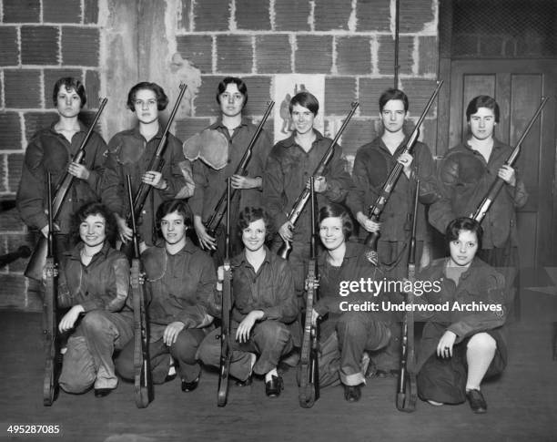 Group shot of the members of the girls rifle team at George Washington University, Washington DC, January 23, 1928.