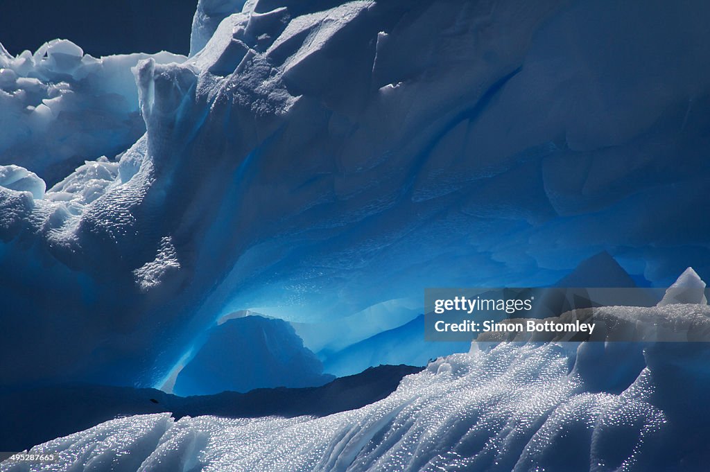 Sunlight shining through ice cave.