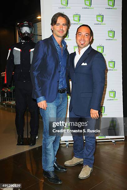 Beppe Convertini and Cristiano De Masi attend the 'Diobo' Che Bello' charity event at D-Store Dainese on May 29, 2014 in Rome, Italy.