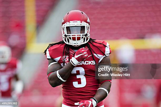 Alex Collins of the Arkansas Razorbacks warming up before a game against the Auburn Tigers at Razorback Stadium on October 24, 2015 in Fayetteville,...