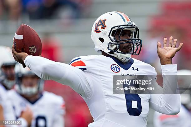 Jeremy Johnson of the Auburn Tigers warming up before a game against the Arkansas Razorbacks at Razorback Stadium Stadium on October 24, 2015 in...