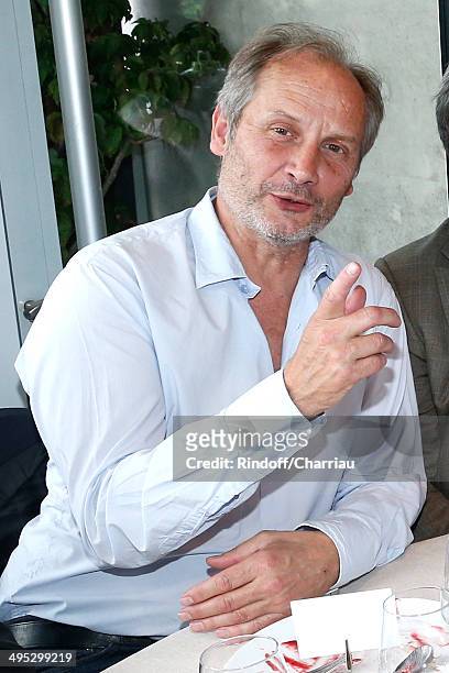 Actor Hippolyte Girardot poses at France Television french chanels studio whyle the Roland Garros French Tennis Open 2014 - Day 9 on June 2, 2014 in...