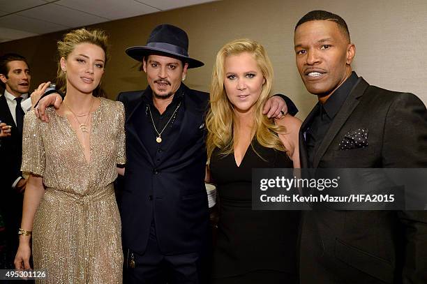 Actors Amber Heard, Johnny Depp, Amy Schumer, and Jaime Foxx attend the 19th Annual Hollywood Film Awards at The Beverly Hilton Hotel on November 1,...