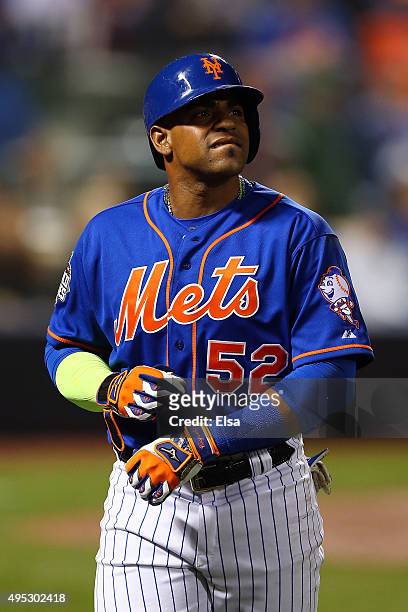 Yoenis Cespedes of the New York Mets walks off the field after flying out in the sixth inning against the Kansas City Royals during Game Five of the...