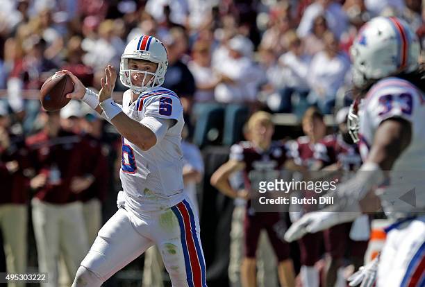 Quarterback Jeff Driskel of the Louisiana Tech Bulldogs throws a pass during the first quarter of an NCAA college football game against the...