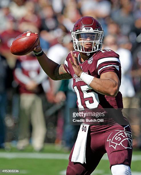 Quarterback Dak Prescott of the Mississippi State Bulldogs looks to throw a pass during the first quarter of an NCAA college football game against...