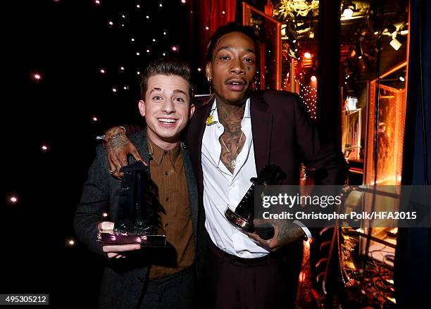 Hollywood Song Award honorees Charlie Puth and Wiz Khalifa pose onstage at the 19th Annual Hollywood Film Awards at The Beverly Hilton Hotel on...