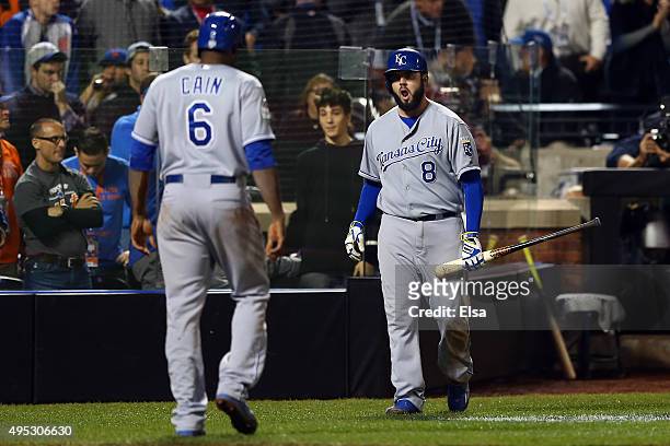 Lorenzo Cain of the Kansas City Royals walks back to the dugout after scoring a run off of a double hit by Eric Hosmer of the Kansas City Royals in...