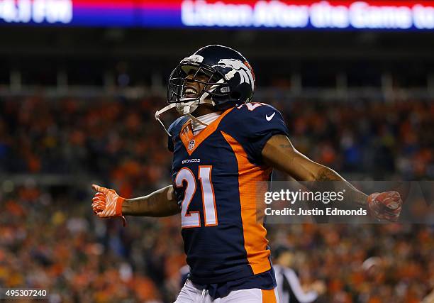 Aqib Talib of the Denver Broncos celebrates the Broncos' safety in the fourth quarter against the Green Bay Packers at Sports Authority Field at Mile...