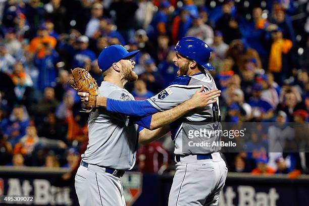 Wade Davis and Drew Butera of the Kansas City Royals celebrate after defeating the New York Mets in Game Five of the 2015 World Series at Citi Field...
